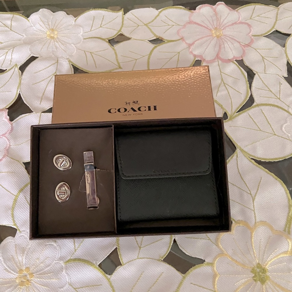 Coach cuff link and tie bar gift box set.
